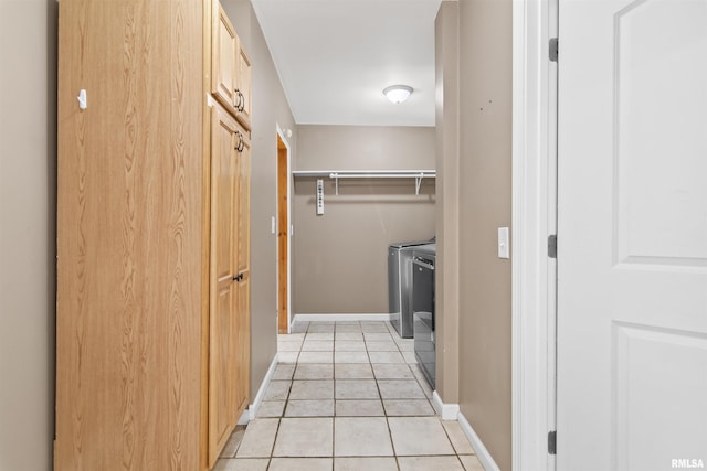 508 N Washington St, Mount Pulaski, IL 62548 - washroom with separate washer and dryer and light tile patterned flooring