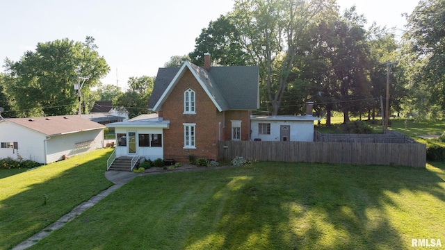 508 N Washington St, Mount Pulaski, IL 62548 - view of front of property with brick siding and a chimney