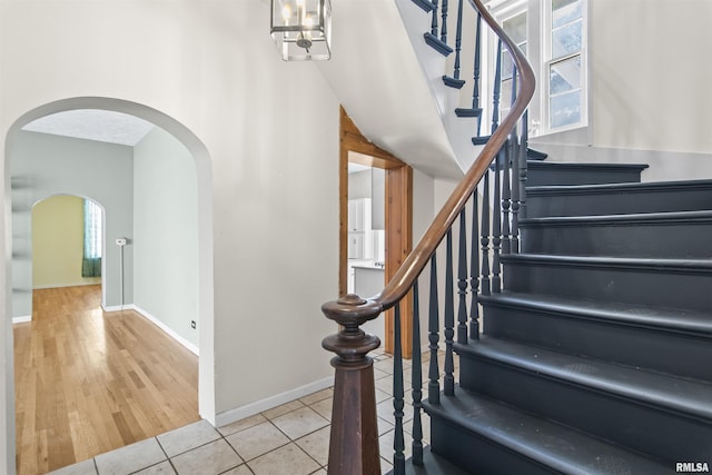508 N Washington St, Mount Pulaski, IL 62548 - stairs with arched walkways and tile patterned flooring