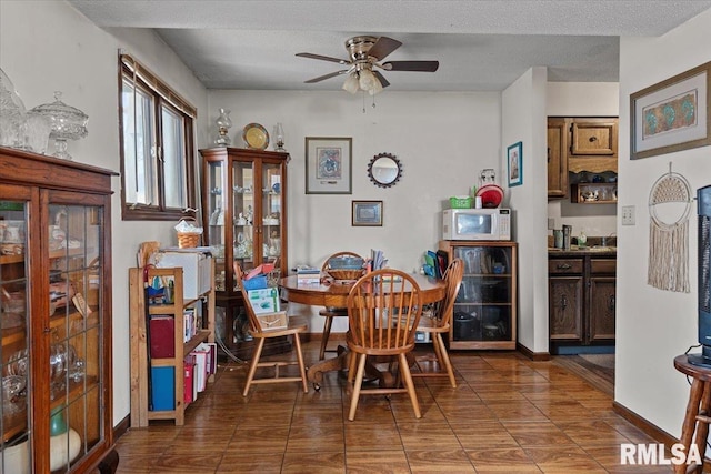 102 W Scarritt St, Springfield, IL 62704 - dining room with ceiling fan and tile patterned flooring