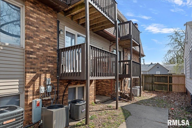 102 W Scarritt St, Springfield, IL 62704 - view of side of home with brick siding and a balcony