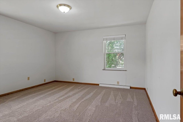 1640 W Glenn Ave, Springfield, IL 62704 - carpeted spare room with a baseboard heating unit and baseboards