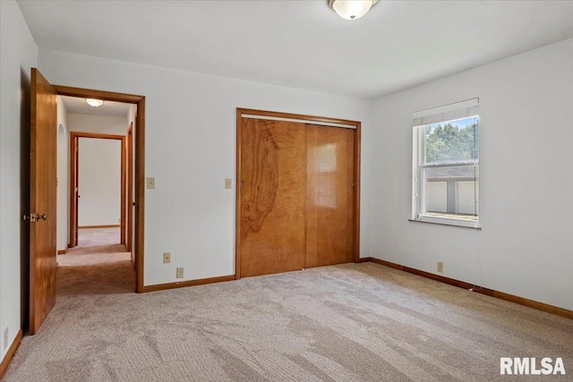 1640 W Glenn Ave, Springfield, IL 62704 - unfurnished bedroom featuring carpet and a closet