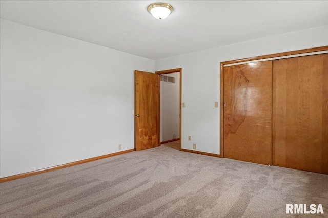1640 W Glenn Ave, Springfield, IL 62704 - unfurnished bedroom featuring carpet and a closet