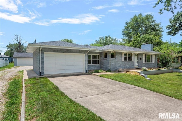 1640 W Glenn Ave, Springfield, IL 62704 - ranch-style house with concrete driveway, a chimney, a garage, a front lawn, and stone siding
