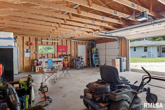 1640 W Glenn Ave, Springfield, IL 62704 - garage featuring a garage door opener