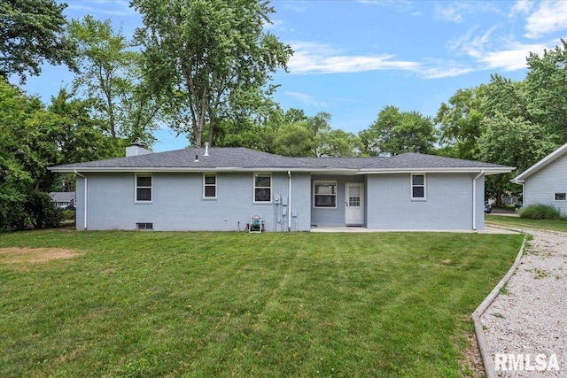 1640 W Glenn Ave, Springfield, IL 62704 - rear view of property featuring a yard, brick siding, and a chimney