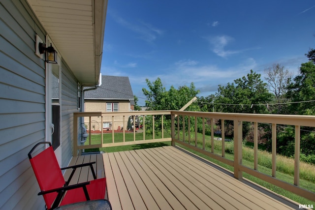 461 Oak St, Hamilton, IL 62341 - wooden deck featuring a lawn