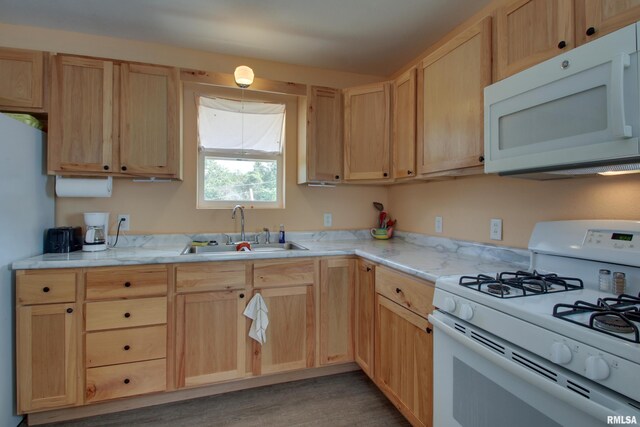 461 Oak St, Hamilton, IL 62341 - kitchen featuring white appliances, light brown cabinets, and wood finished floors