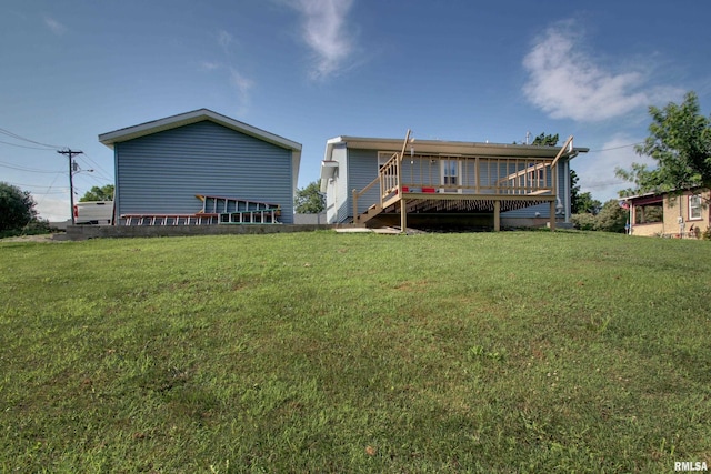 461 Oak St, Hamilton, IL 62341 - rear view of property featuring a lawn, stairway, and a deck