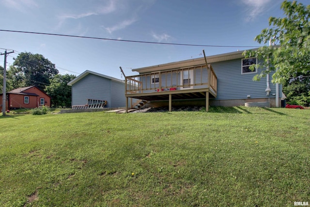 461 Oak St, Hamilton, IL 62341 - back of house featuring a yard and a wooden deck