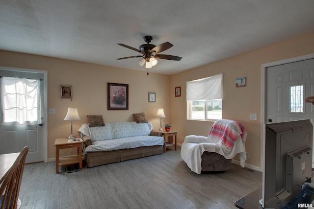 461 Oak St, Hamilton, IL 62341 - living room featuring light wood finished floors and a ceiling fan