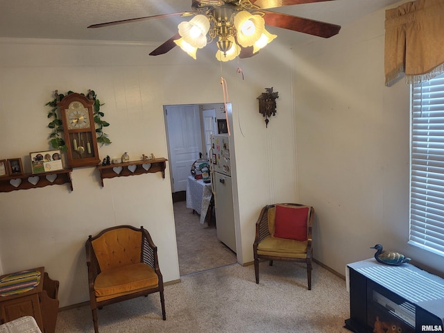 1603 Oak St, Quincy, IL 62301 - sitting room featuring a ceiling fan and light carpet