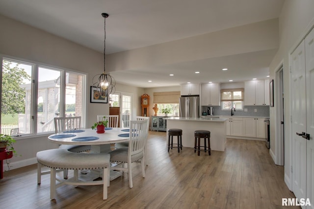 1521 Silverthorne Dr, Quincy, IL 62305 - dining room featuring light wood-style floors and recessed lighting
