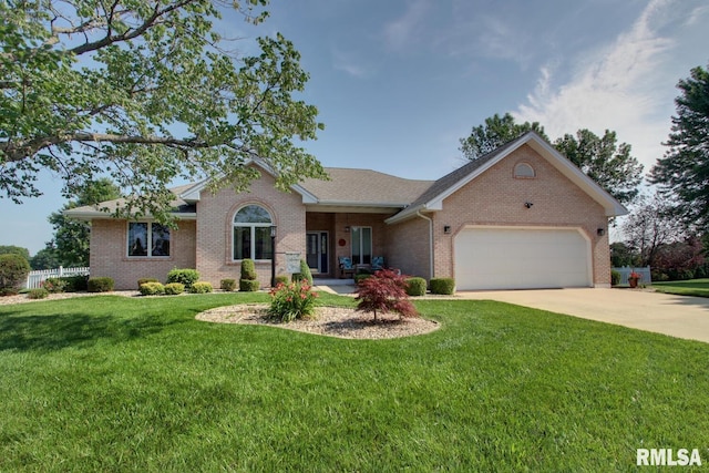 1521 Silverthorne Dr, Quincy, IL 62305 - ranch-style house featuring brick siding, an attached garage, and driveway