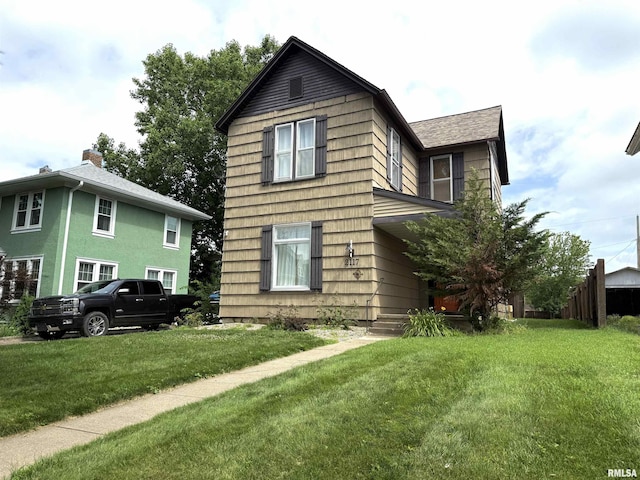 2117 Hampshire St, Quincy, IL 62301 - view of home's exterior featuring a lawn