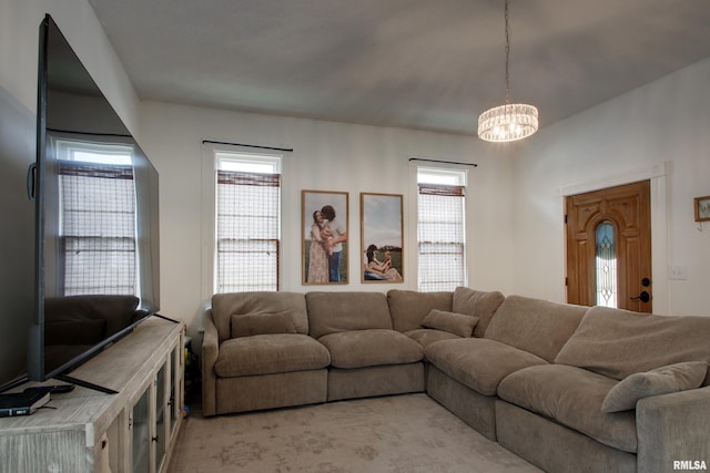 2117 Hampshire St, Quincy, IL 62301 - living room with a chandelier, plenty of natural light, and light colored carpet