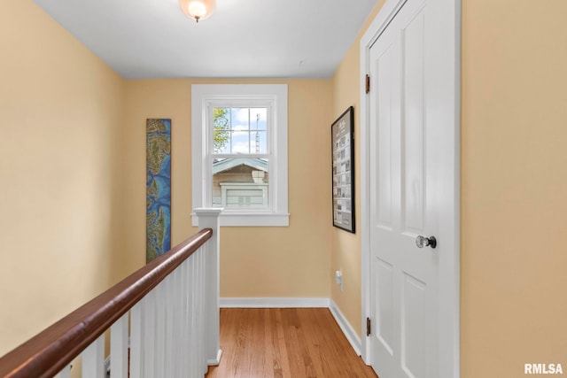 1935 S Douglas Ave, Springfield, IL 62704 - hall with light wood-type flooring and an upstairs landing