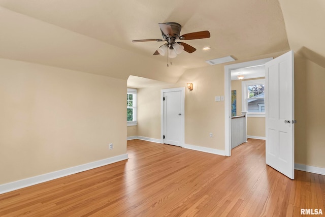 1935 S Douglas Ave, Springfield, IL 62704 - empty room with ceiling fan, light wood-style flooring, vaulted ceiling, and recessed lighting