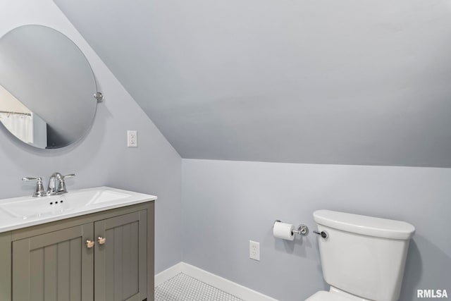 1935 S Douglas Ave, Springfield, IL 62704 - bathroom featuring vaulted ceiling and vanity