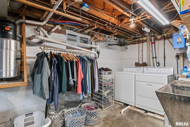 1935 S Douglas Ave, Springfield, IL 62704 - unfinished basement featuring washer and dryer and a sink