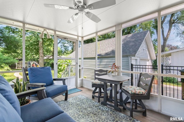 1935 S Douglas Ave, Springfield, IL 62704 - sunroom with a ceiling fan