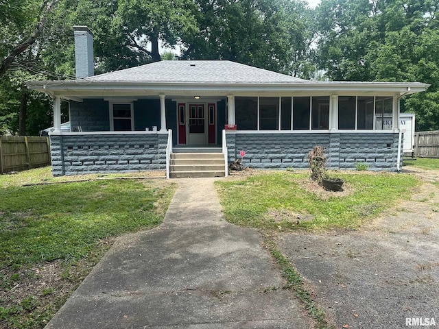 1249 W Urban Ave, Springfield, IL 32704 - view of front facade featuring a chimney, a porch, and roof with shingles