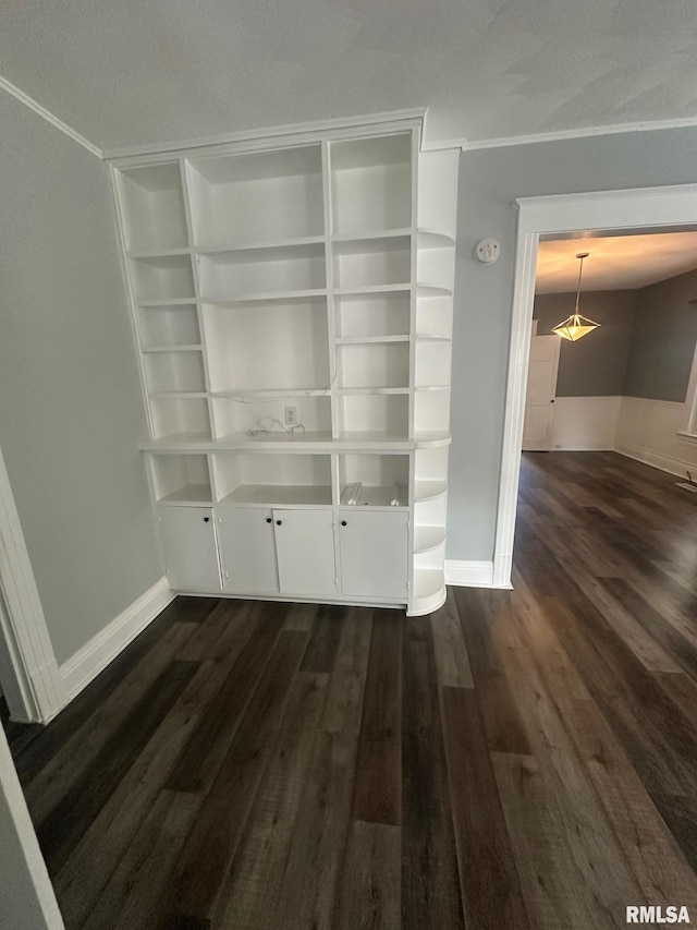 1249 W Urban Ave, Springfield, IL 32704 - unfurnished dining area with dark wood finished floors and baseboards