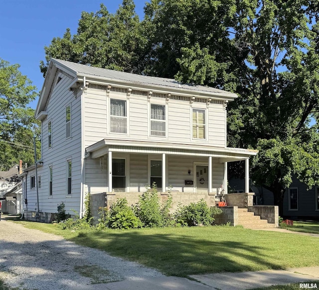 222 N Broadway St, Havana, IL 62644 - italianate home with covered porch and a front yard