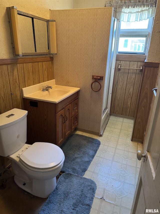 222 N Broadway St, Havana, IL 62644 - bathroom with a stall shower, vanity, and tile patterned floors