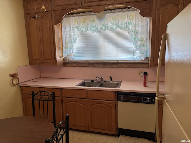 222 N Broadway St, Havana, IL 62644 - kitchen with white appliances, light countertops, and brown cabinetry