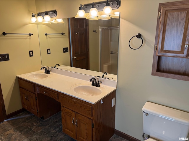 1804 Hunter Ridge Dr, Springfield, IL 62704 - bathroom with double vanity, a shower stall, and stone finish flooring