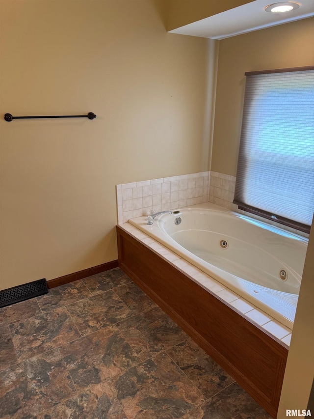 1804 Hunter Ridge Dr, Springfield, IL 62704 - full bathroom with a tub with jets and stone finish floors