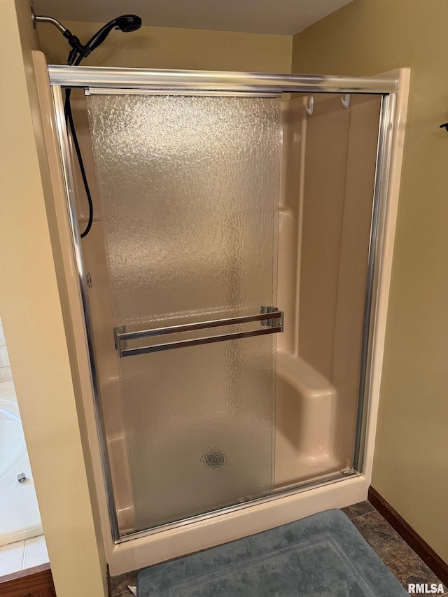 1804 Hunter Ridge Dr, Springfield, IL 62704 - bathroom with a stall shower and baseboards
