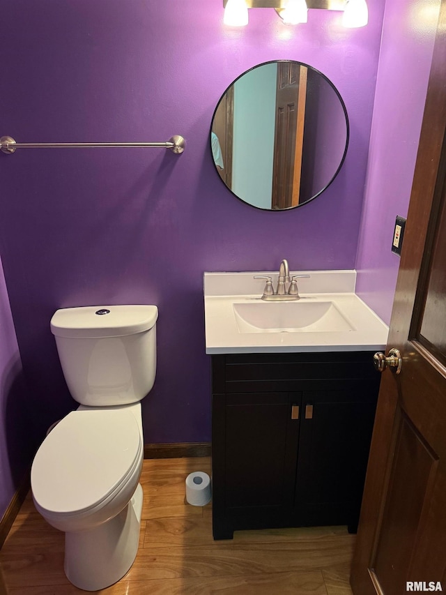 1804 Hunter Ridge Dr, Springfield, IL 62704 - half bath featuring vanity and wood finished floors