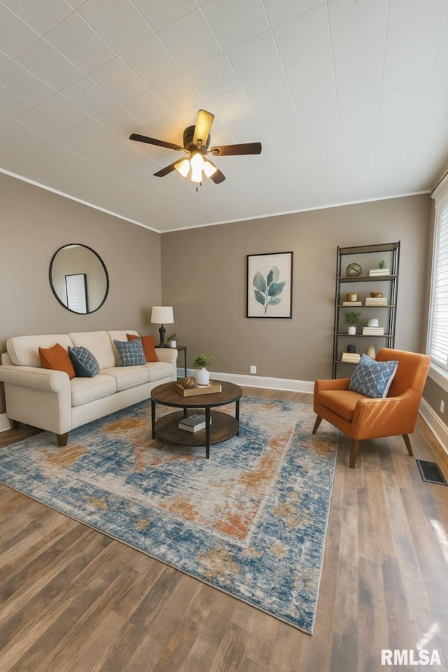 815 Washington St, Quincy, IL 62301 - living room with wood finished floors and ceiling fan