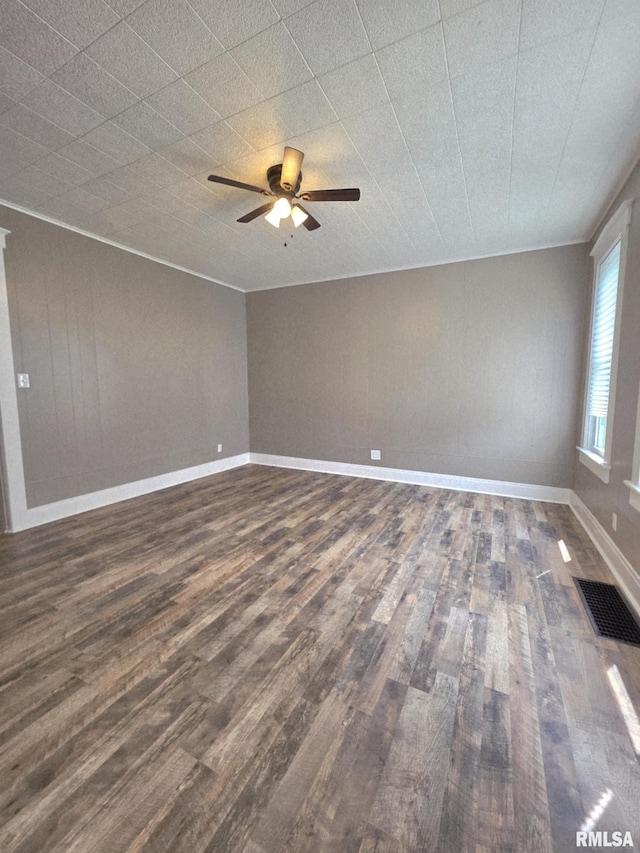 815 Washington St, Quincy, IL 62301 - unfurnished room featuring dark wood finished floors, ceiling fan, and ornamental molding