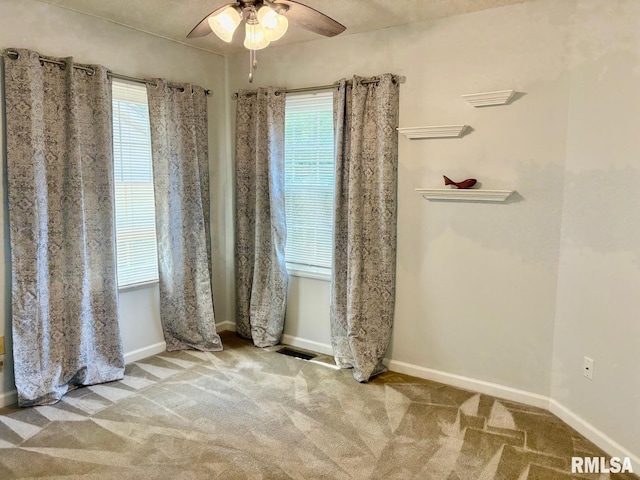 3205 Ashley Ln, Springfield, IL 62711 - empty room featuring a ceiling fan and carpet