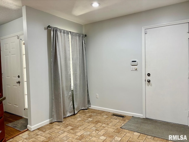 3205 Ashley Ln, Springfield, IL 62711 - entryway featuring brick patterned flooring and recessed lighting