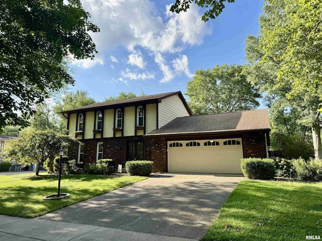 125 Pinehurst Dr, Springfield, IL 62704 - view of front facade with a garage, a front yard, brick siding, and driveway