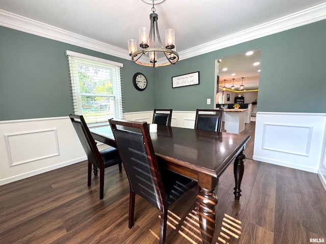 125 Pinehurst Dr, Springfield, IL 62704 - dining room featuring a wainscoted wall, a chandelier, a decorative wall, dark wood-type flooring, and crown molding