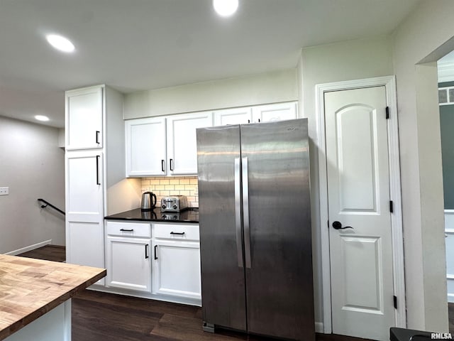 125 Pinehurst Dr, Springfield, IL 62704 - kitchen with freestanding refrigerator, wood counters, white cabinetry, backsplash, and recessed lighting