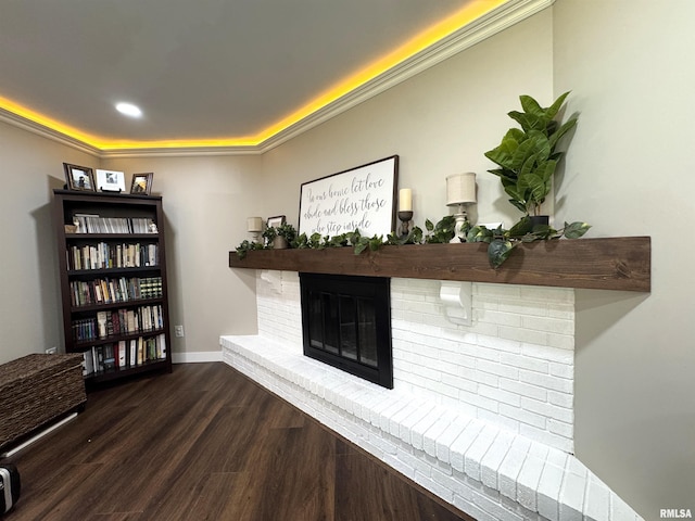 125 Pinehurst Dr, Springfield, IL 62704 - interior space with a brick fireplace, dark wood finished floors, recessed lighting, and a tray ceiling
