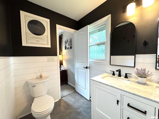 125 Pinehurst Dr, Springfield, IL 62704 - bathroom with vanity and a wainscoted wall