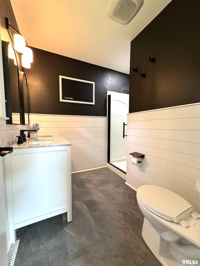 125 Pinehurst Dr, Springfield, IL 62704 - full bathroom with a shower stall, vanity, wainscoting, and wood walls