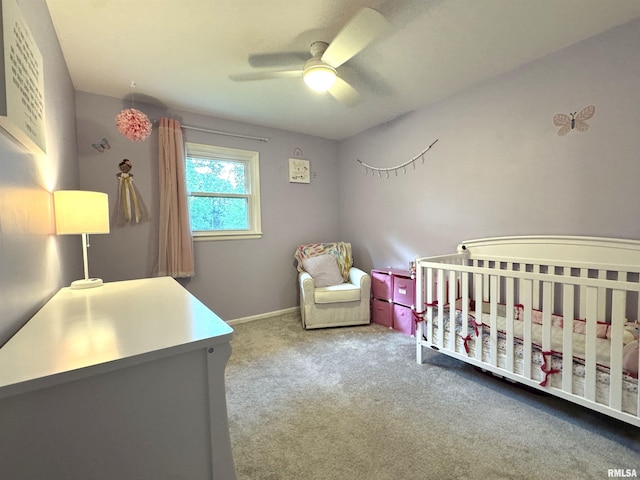 125 Pinehurst Dr, Springfield, IL 62704 - bedroom featuring carpet floors, a crib, and ceiling fan
