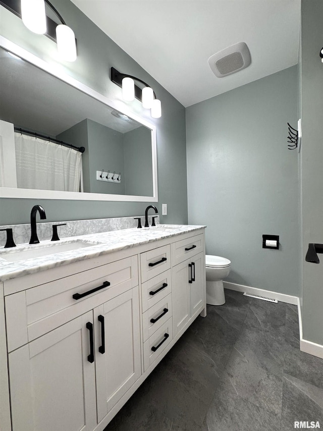 125 Pinehurst Dr, Springfield, IL 62704 - bathroom with double vanity and toilet
