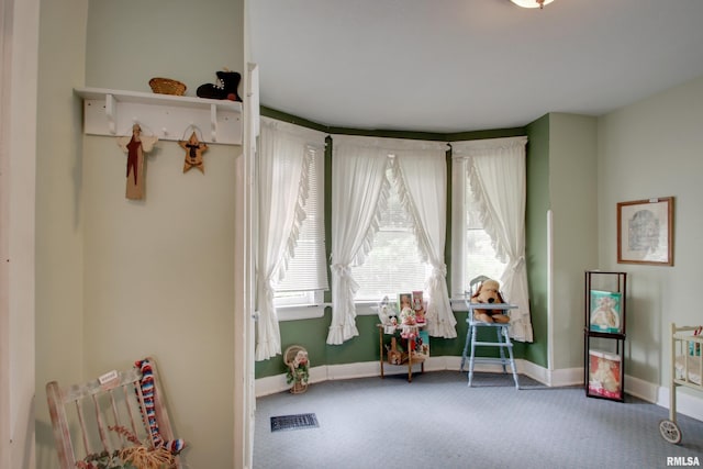 229 S 11th St, Quincy, IL 62301 - living area with carpet floors and baseboards