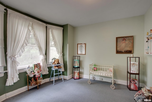 229 S 11th St, Quincy, IL 62301 - misc room featuring carpet floors and baseboards