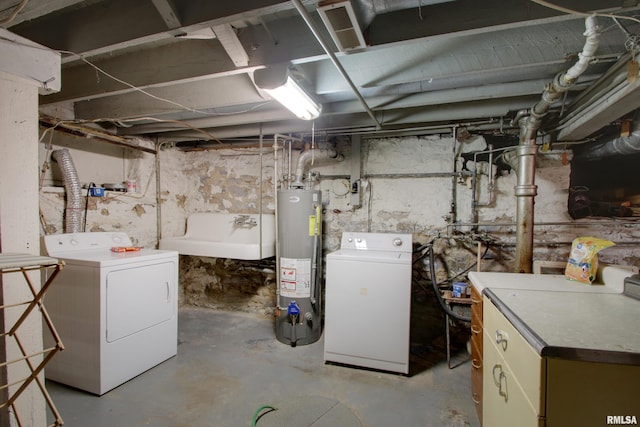 229 S 11th St, Quincy, IL 62301 - unfinished basement with gas water heater and independent washer and dryer